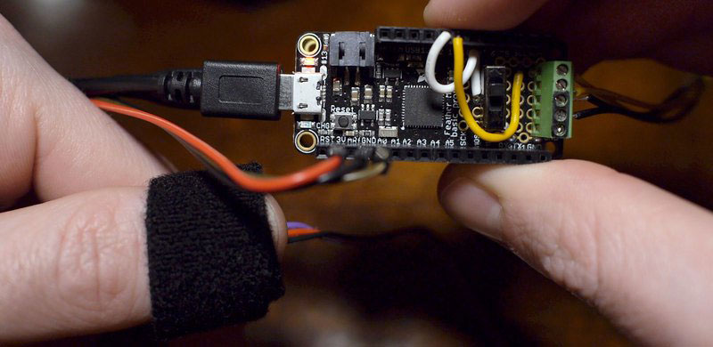 Red LED on Feather M0 will flash at every beat